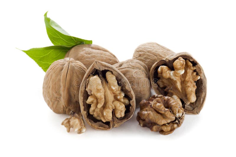Molte delle noci sulla tabella immagini stock Molte delle noci sulla tabella immagini stock