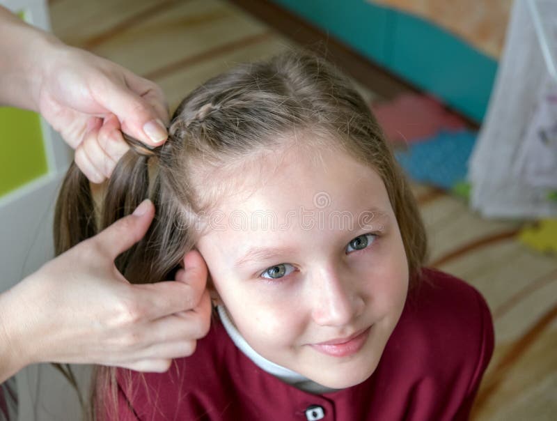 Little Girl Braided Hair in Front of School. Mom Makes Her Daughter`s  Hairstyle. Stock Image - Image of nature, hairdresser: 186509791