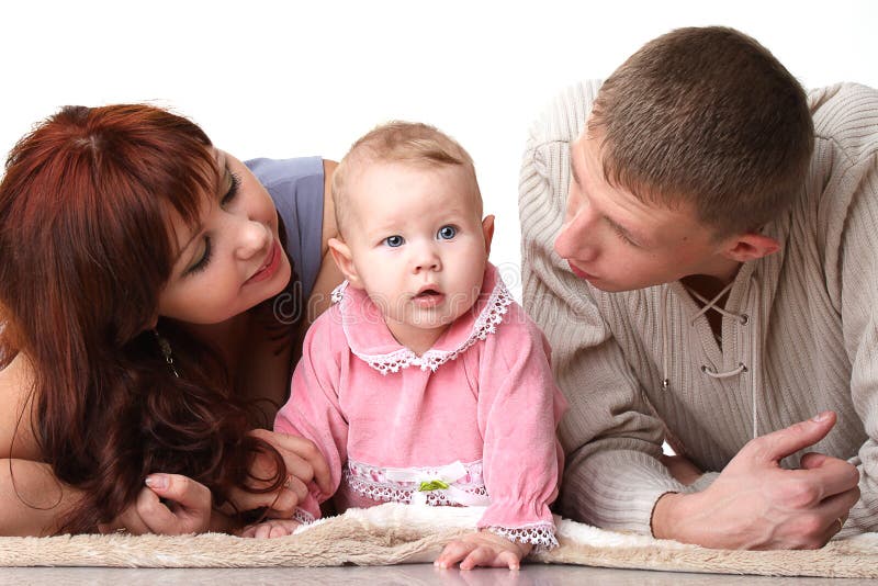 Mom and Dad talking to a child