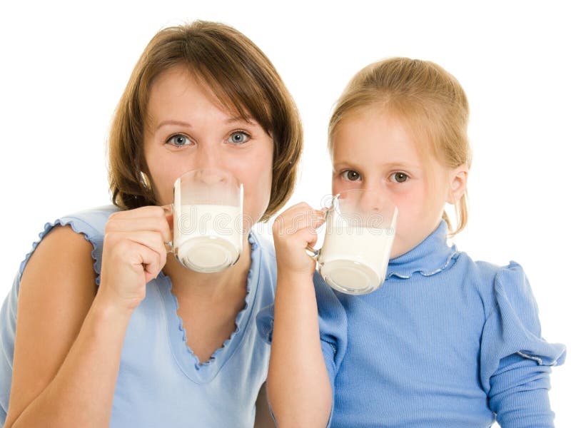 Mom and daughter drink milk.