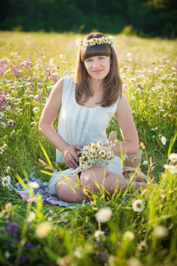 Mom and Daughter on a Picnic in the Chamomile Field. Two Beautiful ...
