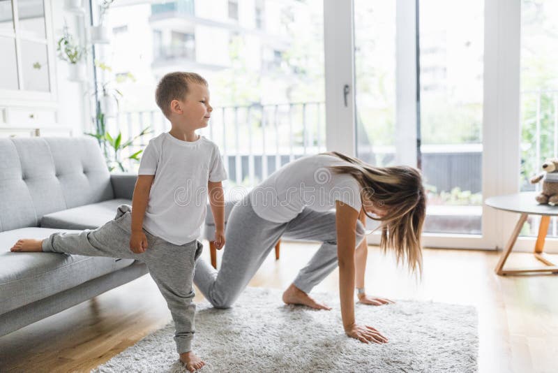 Mom With Her Son Working Out In The Living Room Stock Image Image Of 