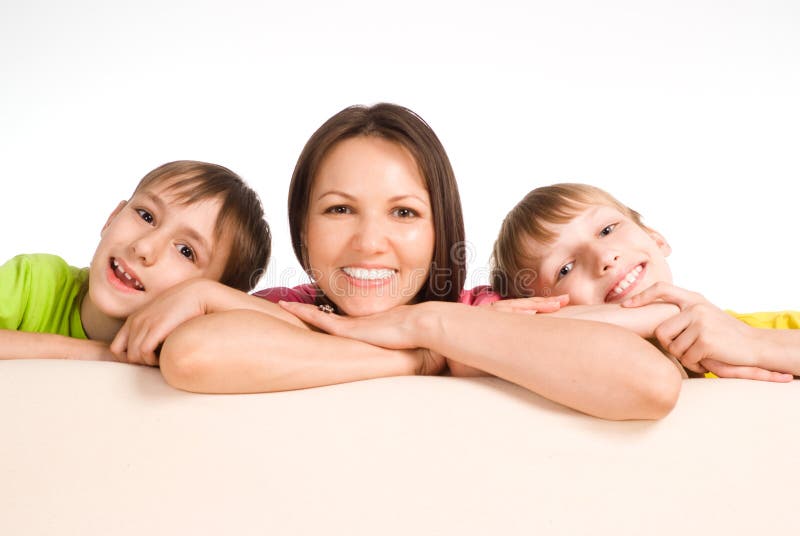 Mom with kids on sofa