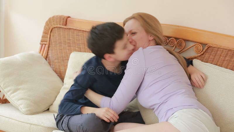 800px x 450px - Mom and Son Chatting Heart To Heart on the Wicker Sofa Stock Video - Video  of love, care: 90194563