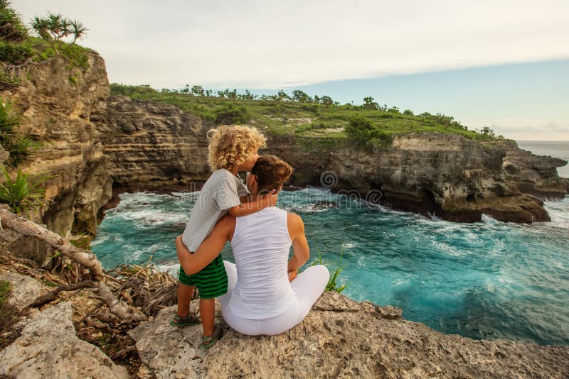 Mom with son by the ocean royalty free stock images