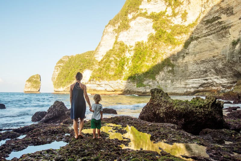 Mom with son by the ocean royalty free stock images