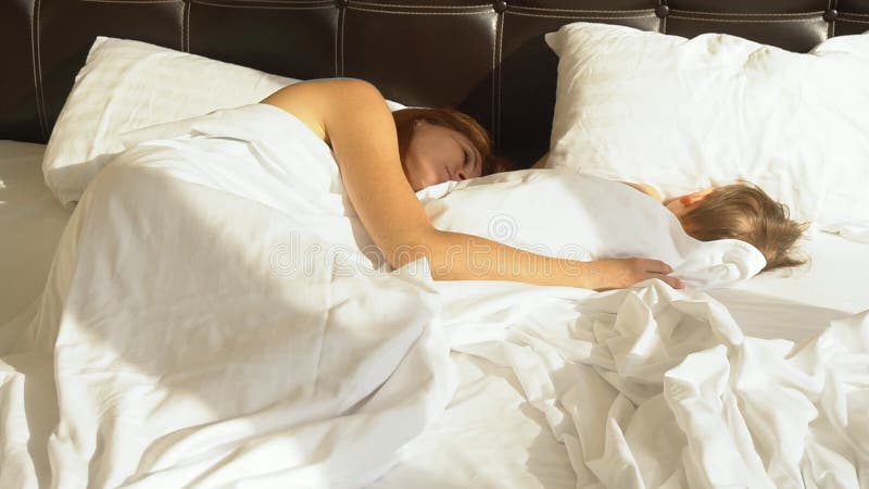 800px x 450px - Mom and Son Sleep in the Morning in Bed at Stock Footage - Video of  beautiful, home: 101868792