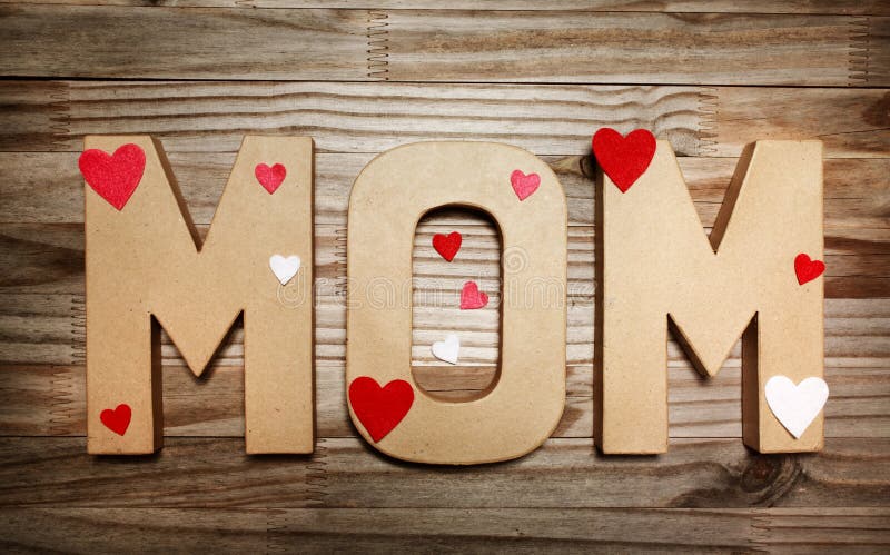 MOM Text in Big Cardboard Letters with Heart Shaped Decorations Stock ...