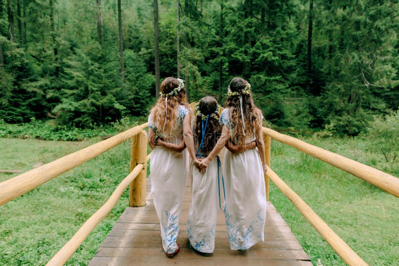 Mom and Two Daughters Walking Near the Lake . Stock Image - Image of ...