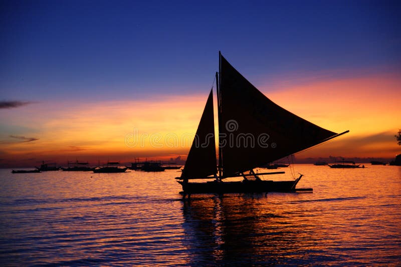 Excellent Magic Moment in boracay island with beautiful sky and sailing boat. Excellent Magic Moment in boracay island with beautiful sky and sailing boat