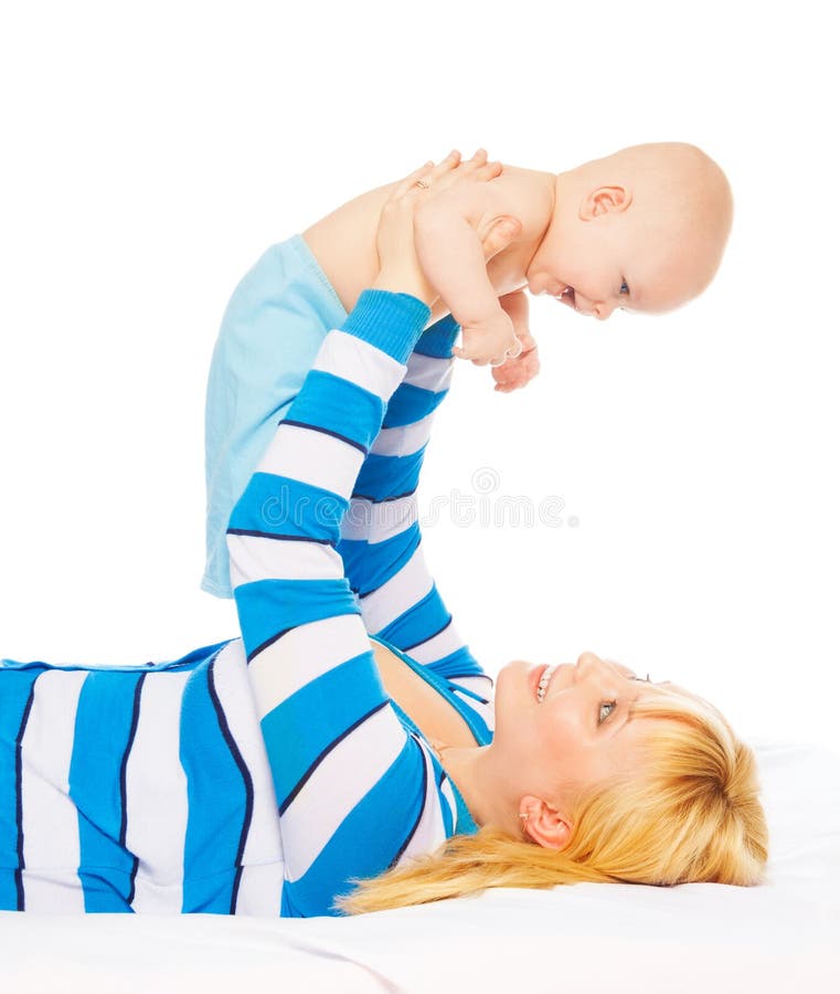 Mommy lifting little baby