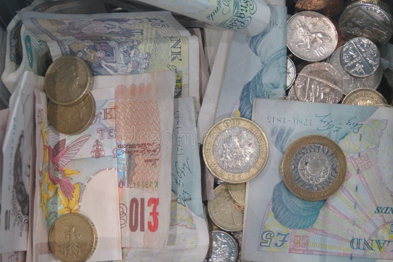Moneda de las monedas y de los billetes de banco de libra británica del Reino Unido imagen de archivo Moneda de las monedas y de los billetes de banco de libra británica del Reino Unido imagen de archivo