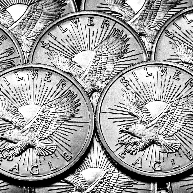 Monedas de Eagles de plata foto de archivo Monedas de Eagles de plata foto de archivo