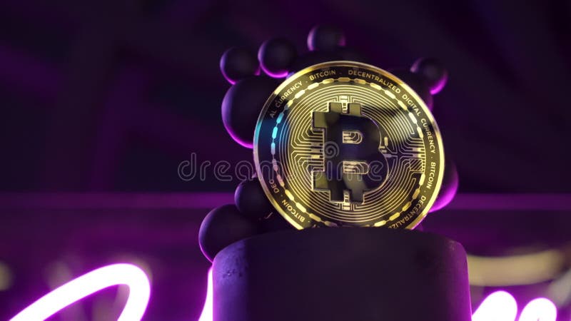 Moneta bitcoina w neonie