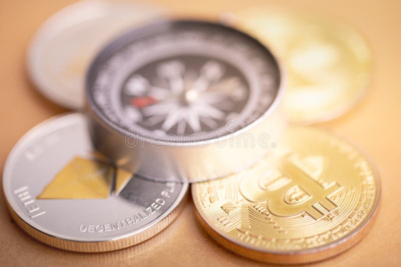 Moneta e bussola di Bitcoin immagine stock