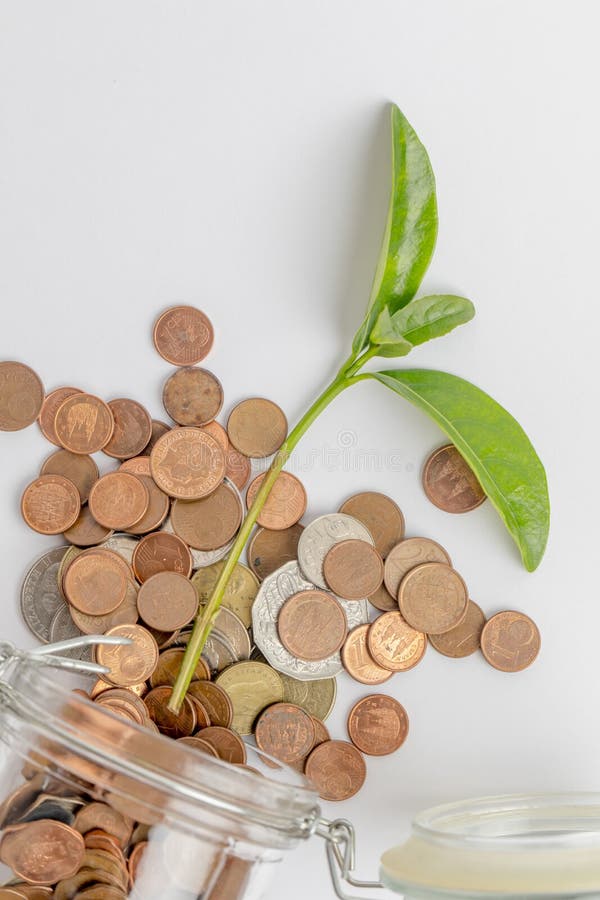 Savings jar with coins inside. Financial cash concept. Savings jar with coins inside. Financial cash concept.