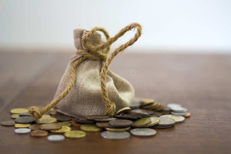 Money bag and coins stock image. Image of economic, budget 129673979