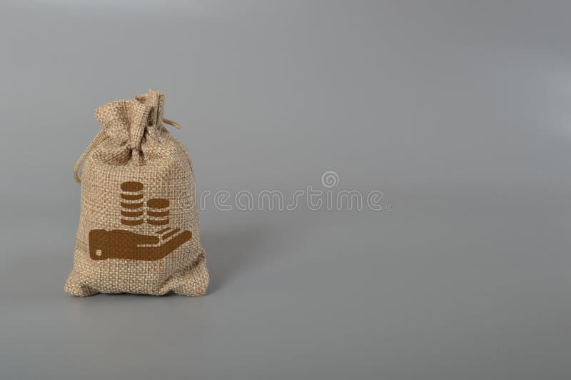 Money Bag with Hand Holding Money. Saving Money for Future Investment Concept Stock Photo