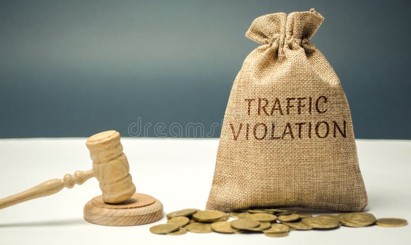 Money bag with the word Traffic violation and the judge`s hammer. Law. Court. Fine, legal fees. Traffic Tickets. Speeding. Failur