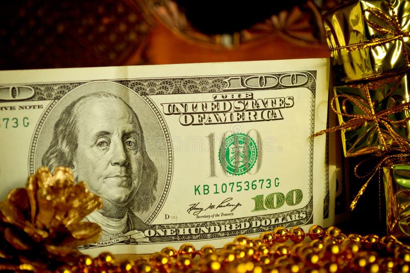 Golden gifts, money and Christmas decorations. Golden gifts, money and Christmas decorations