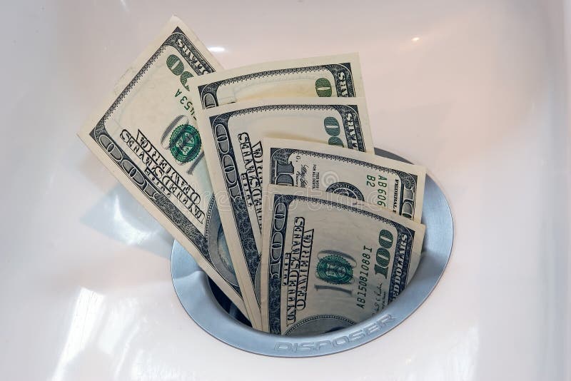 Money Down the Drain stock photo. Image of dispose, disposal 1568872