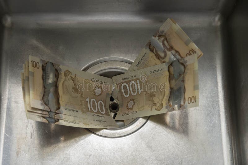 Money down the drain stock image. Image of dollar, finance 192300357