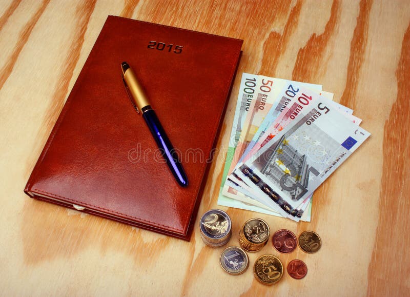 Money euro calendar notes and pen royalty free stock photo