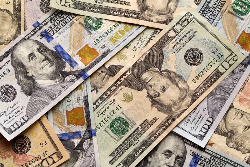 Money and finances concept. Abstract light background of American USA national currency banknotes, details of different bills stock images Money and finances concept. Abstract light background of American USA national currency banknotes, details of different bills stock images
