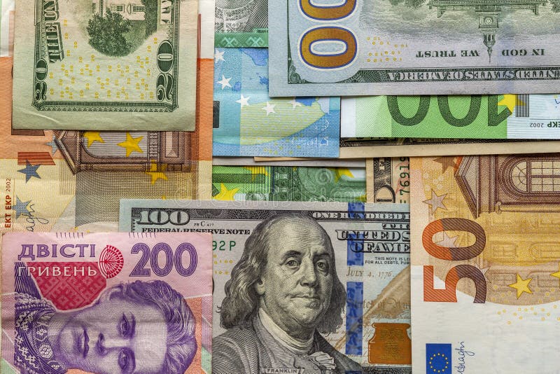 Money and finances concept. One hundred dollar new bill on colorful abstract background of Ukrainian, American and euro national stock photos Money and finances concept. One hundred dollar new bill on colorful abstract background of Ukrainian, American and euro national stock photos
