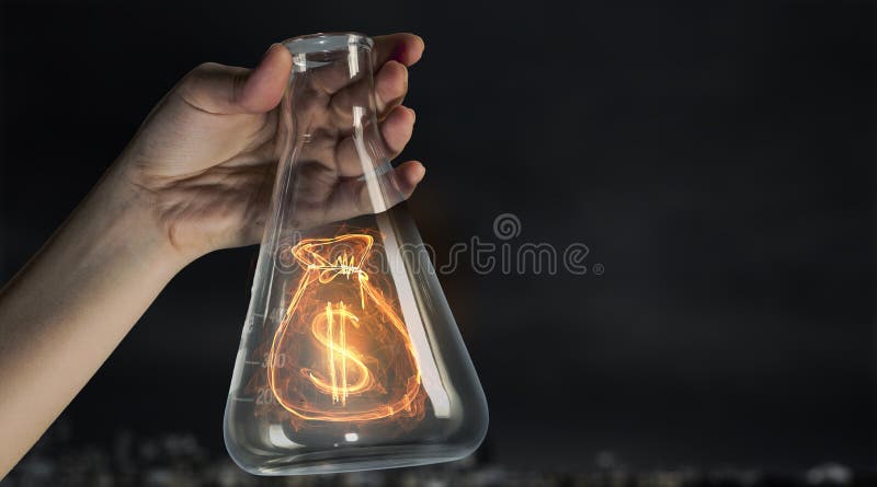 Hand holding glass test tube with money sign inside. Hand holding glass test tube with money sign inside