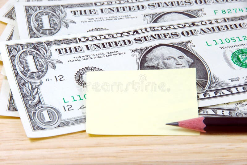 Money and note pad. stock photo. Image of investment 39795014