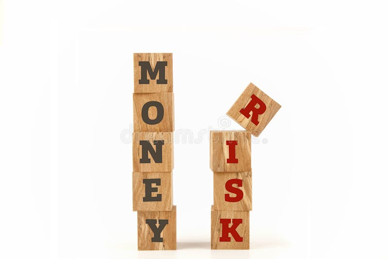 Money and Risk word written on cube shape. stock photos