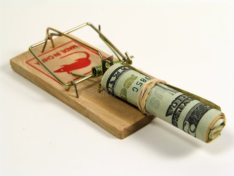 Money Trap. Photo of a Mouse Trap With a Roll of Money as Bait Money Trap. Photo of a Mouse Trap With a Roll of Money as Bait