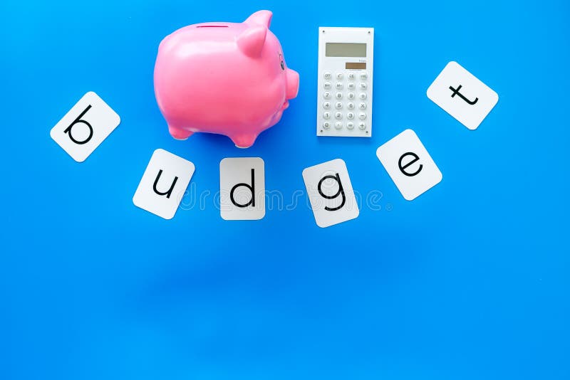 Download Moneybox In Shape Of Pig And Calculator For Business Budget On Blue Background Top View Mockup Stock Photo Image Of Businessman Budget 151646332