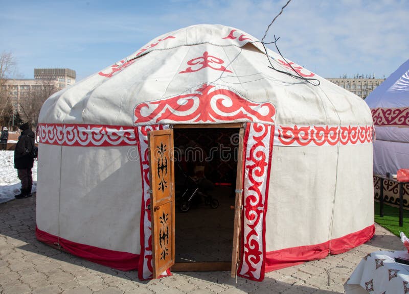 Mongolian yurt on the grass in the park. Mongolian yurt on the grass in the park.