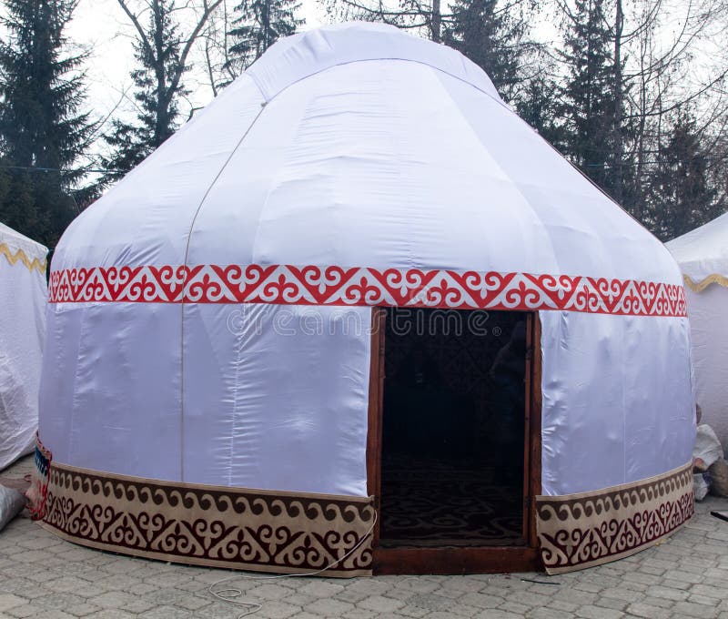 Mongolian yurt on the grass in the park. Mongolian yurt on the grass in the park.