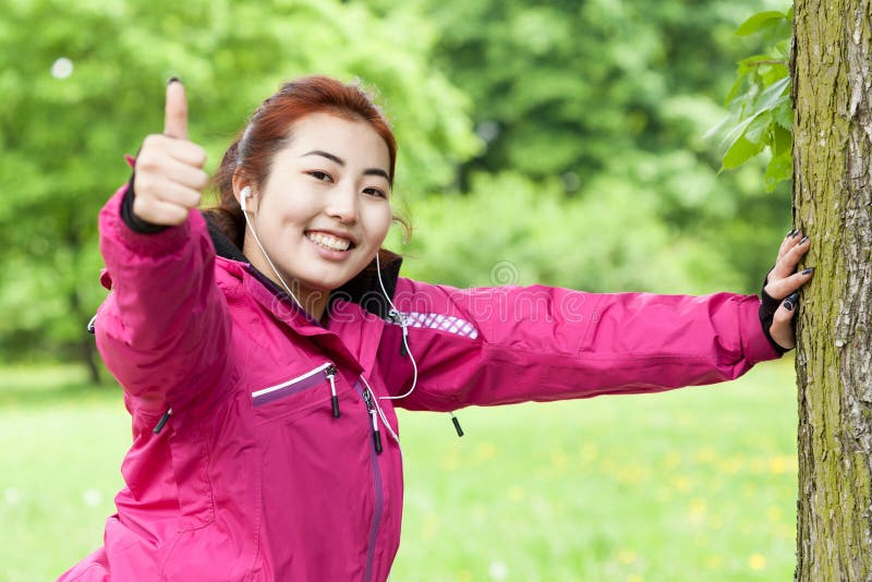 Mongolian woman doing sport stock photography