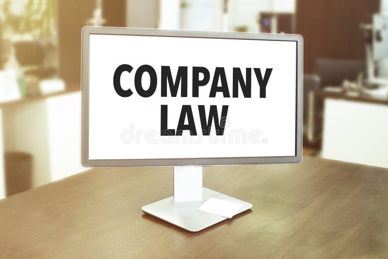 Monitor in Modern Office with Text Company Law on the Screen in the