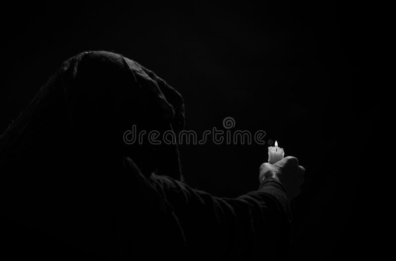 Monk with candle. stock image. Image of solitude, night 79760855