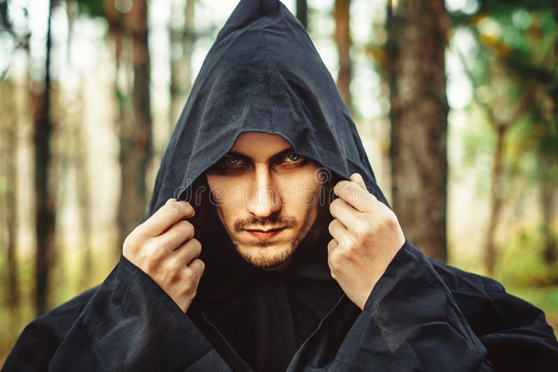 A monk in the hood royalty free stock photos