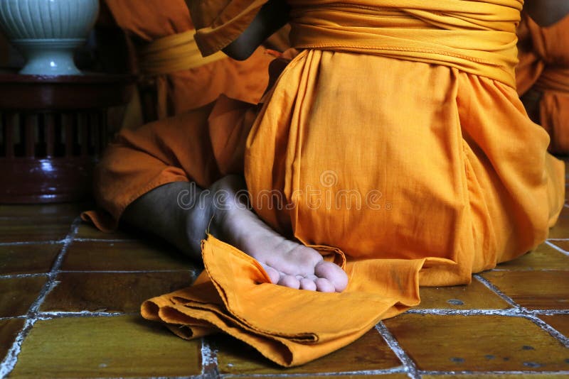 Monk praying stock photography