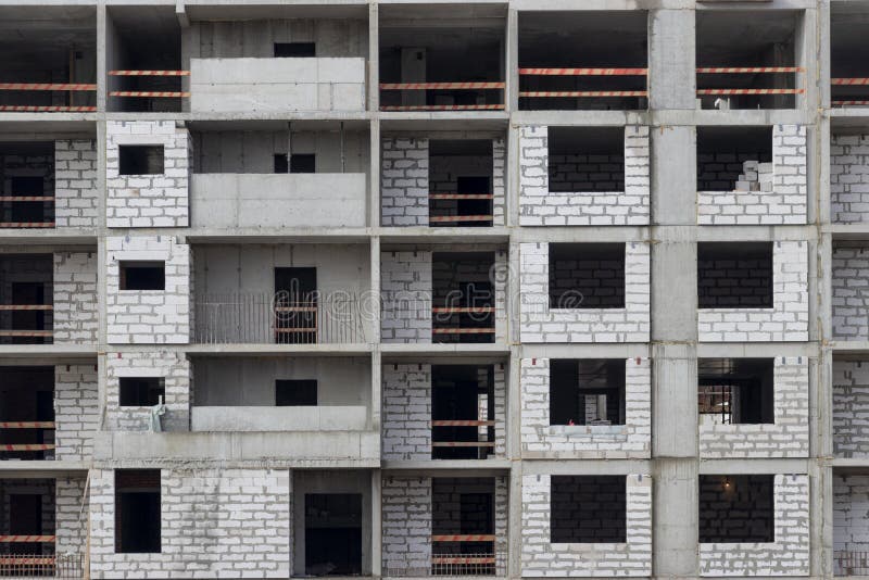 Monolithic Frame Construction of the Building. Solid Walls of Concrete