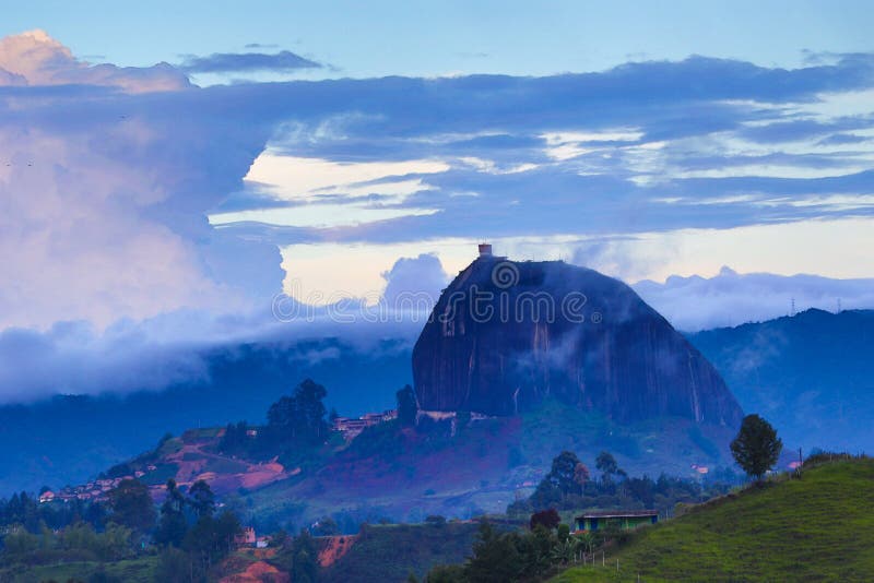 The monolith of Guatape at sunset. The monolith of Guatape at sunset