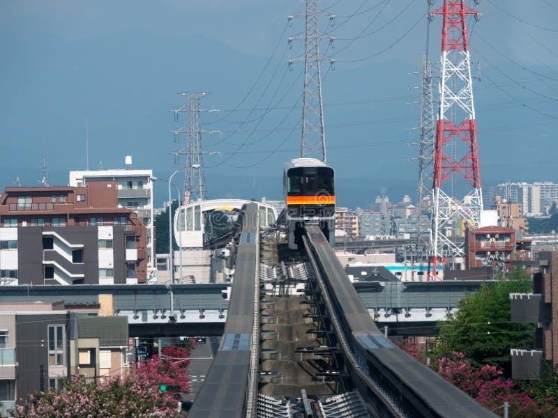 A Monorail Train on the Elevated Railway Track in Japan Stock Photo