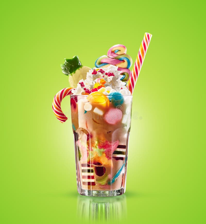 Monster shake, freak caramel shake isolated. Colourful, festive milk shake cocktail with sweets, jelly. Colored caramel