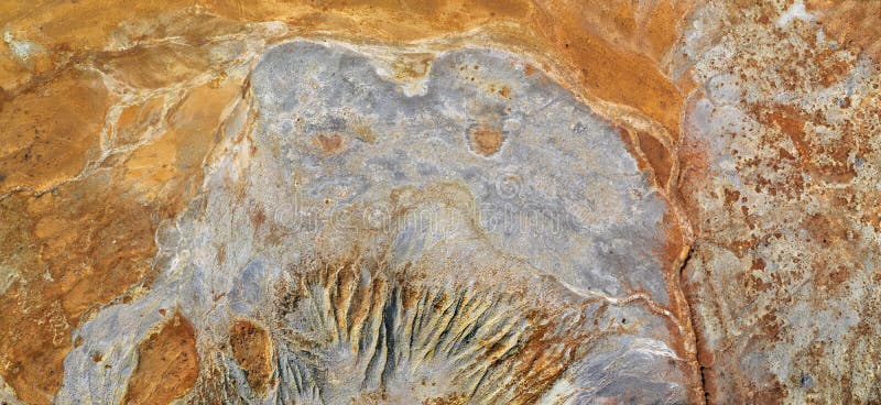 Monster shaped grey stain over rusty orange background. Natural texture from old copper mine royalty free stock photo Monster shaped grey stain over rusty orange background. Natural texture from old copper mine royalty free stock photo