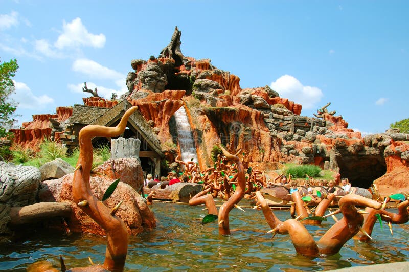 One of the Magic Kingdoms major attractions is Splash Mountain. Based on the 1946 Walt Disney film, Song of the South, this ride features the antics of Brer Fox and Brer Bears attempts to catch the wily Brer Rabbit as he looks for his laughing place. Over 100 Audio-animatronic figures entertain you as your log boat winds its way through caves, swamps and bayous, and down three minor drops before climaxing with a 52 foot plunge through the briar patch after Brer Rabbit outfoxes Brer Fox. A camera captures the look of fearful delight on your faces as you enter the final plunge. These pictures are displayed at the end of the ride and are available for purchase. One of the Magic Kingdoms major attractions is Splash Mountain. Based on the 1946 Walt Disney film, Song of the South, this ride features the antics of Brer Fox and Brer Bears attempts to catch the wily Brer Rabbit as he looks for his laughing place. Over 100 Audio-animatronic figures entertain you as your log boat winds its way through caves, swamps and bayous, and down three minor drops before climaxing with a 52 foot plunge through the briar patch after Brer Rabbit outfoxes Brer Fox. A camera captures the look of fearful delight on your faces as you enter the final plunge. These pictures are displayed at the end of the ride and are available for purchase.