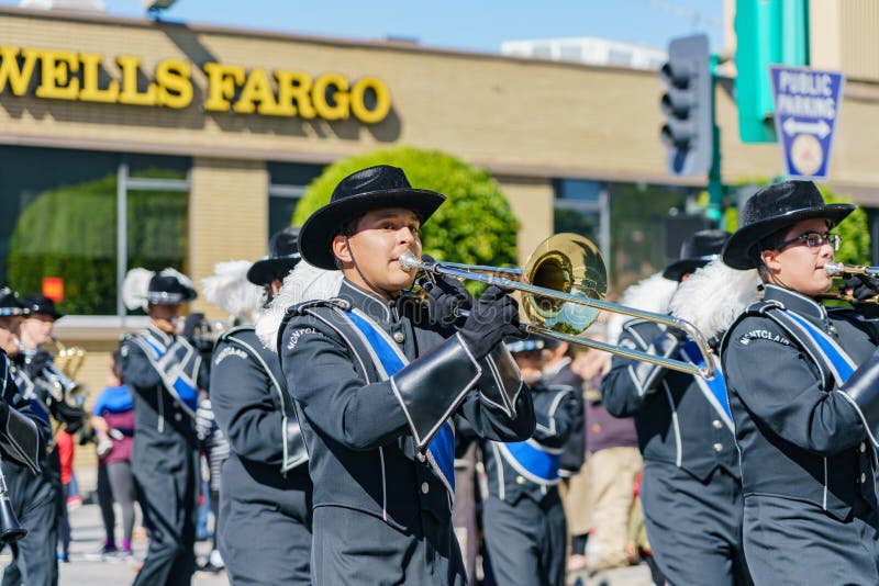 Los Angeles, FEB 23: Montclair High School Marching band parade in the Camellia Festival on FEB 23, 2019 at Los Angeles, California. Los Angeles, FEB 23: Montclair High School Marching band parade in the Camellia Festival on FEB 23, 2019 at Los Angeles, California