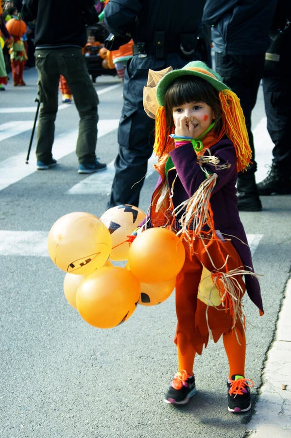 Montenegro, Kotor - 03/13/2016: Child in bright carnival costume. royalty free stock photos Montenegro, Kotor - 03/13/2016: Child in bright carnival costume. royalty free stock photos