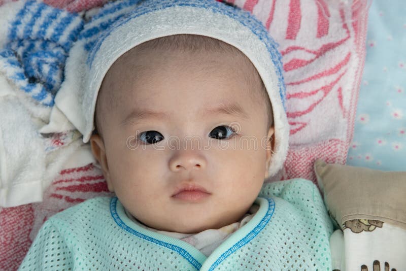 1.5 Month Old Asian Baby is Happy To Suck Breast Milk Stock Image